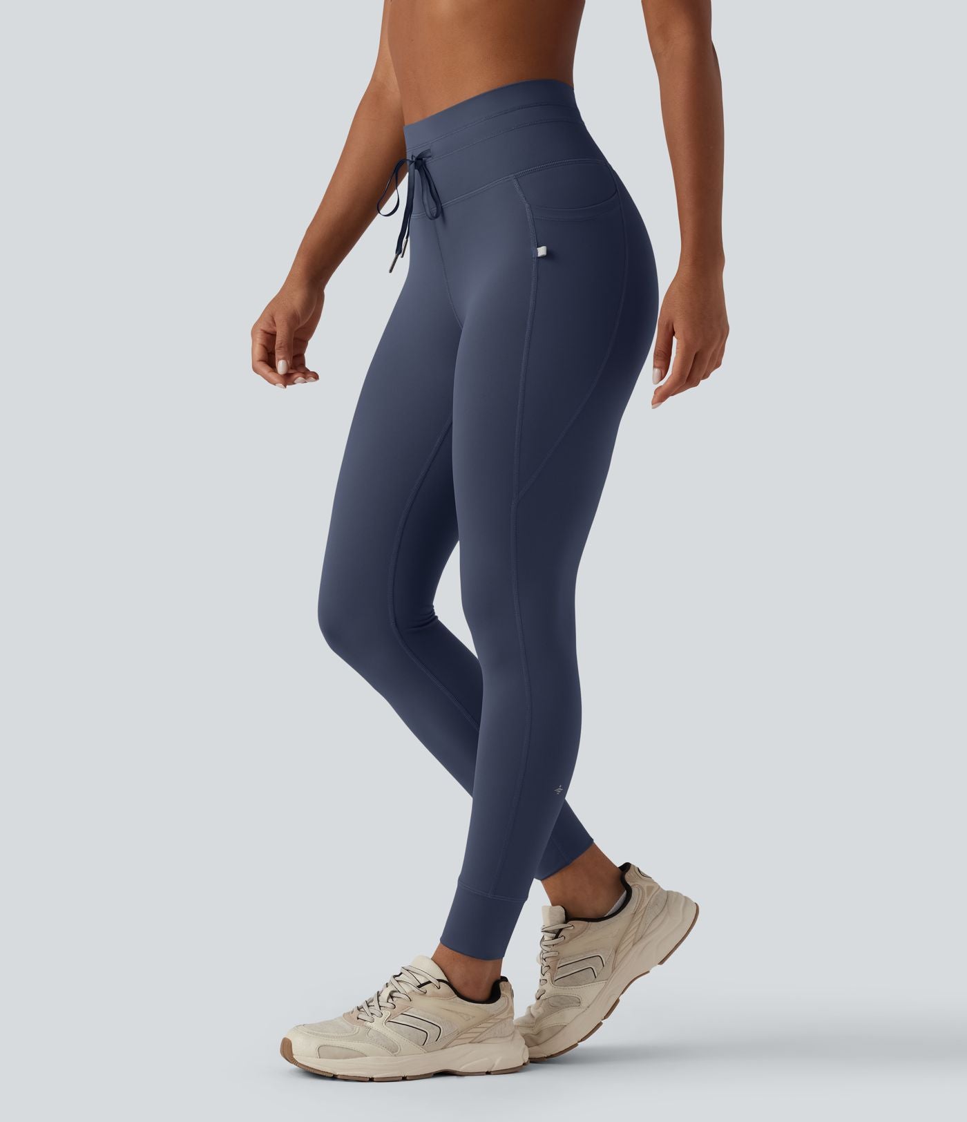 Legging 7/8 de yoga taille haute avec cordon de serrage uni et poches