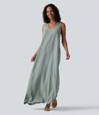 Robe maxi fluide de vacances en mélange de lin col U sans manches dos torsadé à poches