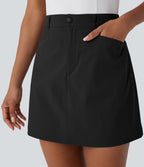 Jupe courte de golf ligne A taille haute avec boutons, zip, poches latérales et fente