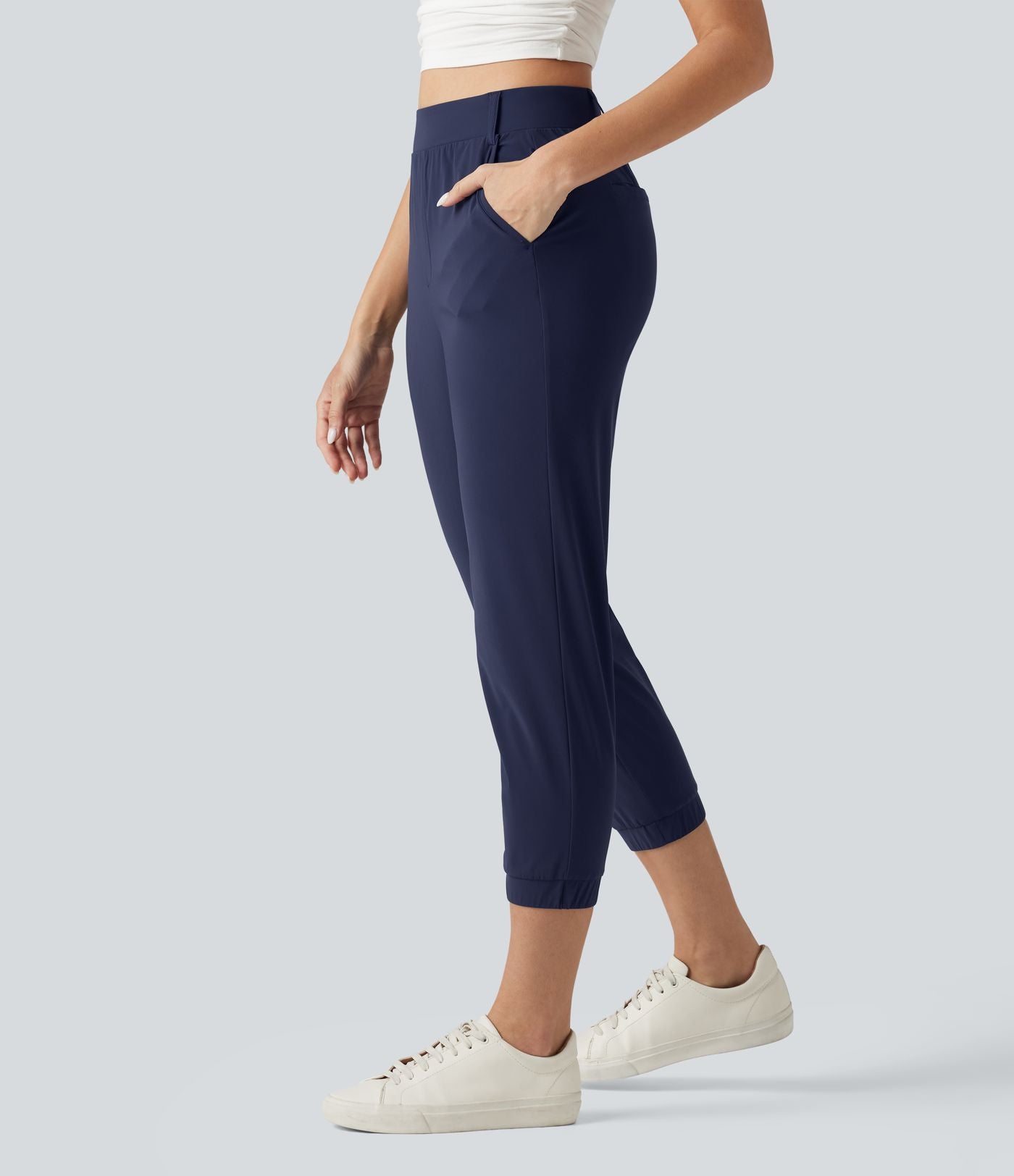 Jogging court taille haute à séchage rapide pour le golf avec poches