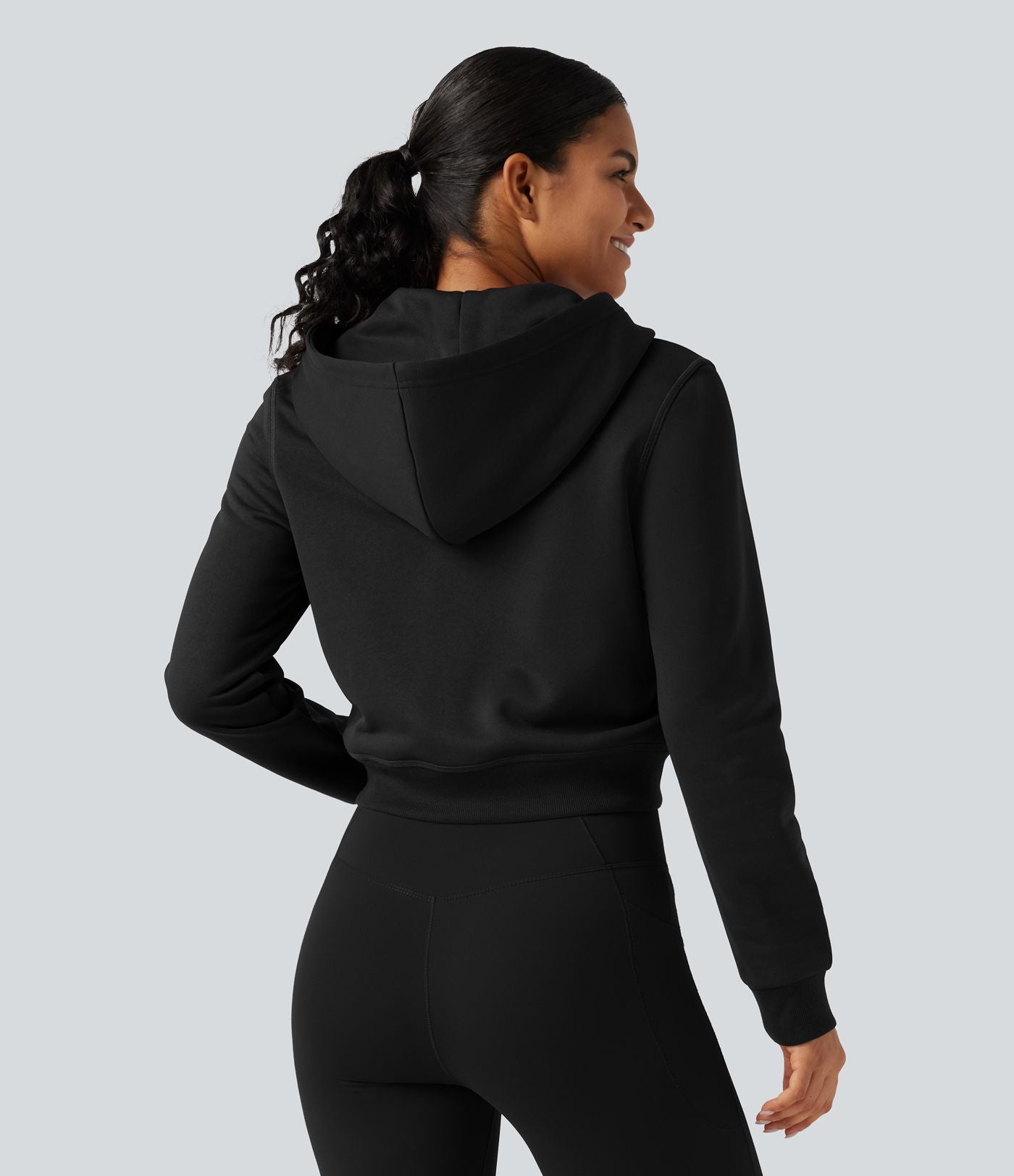 Veste de sport polaire à capuche, manches longues, zip et poches