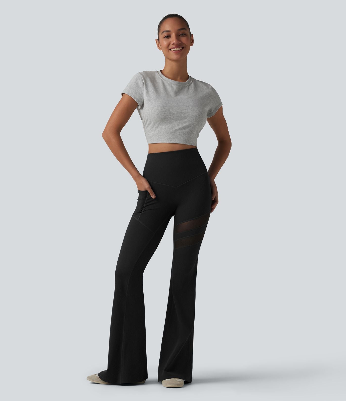 Legging décontracté DayStretch taille haute gainant et galbant les fesses, avec poche, empiècement en maille contrastée et coupe évasée