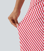 Jupe longue moulante taille mi-haute avec nœud devant et fronces imprimé floral/à rayures