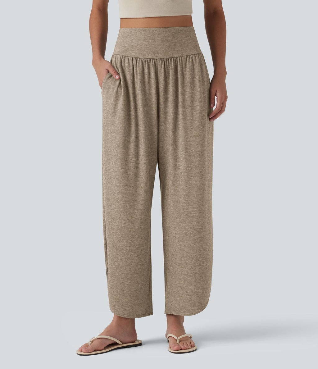 Pantalon décontracté taille haute gainant avec ourlet arrondi et poches