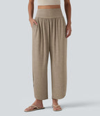 Pantalon décontracté taille haute gainant avec ourlet arrondi et poches