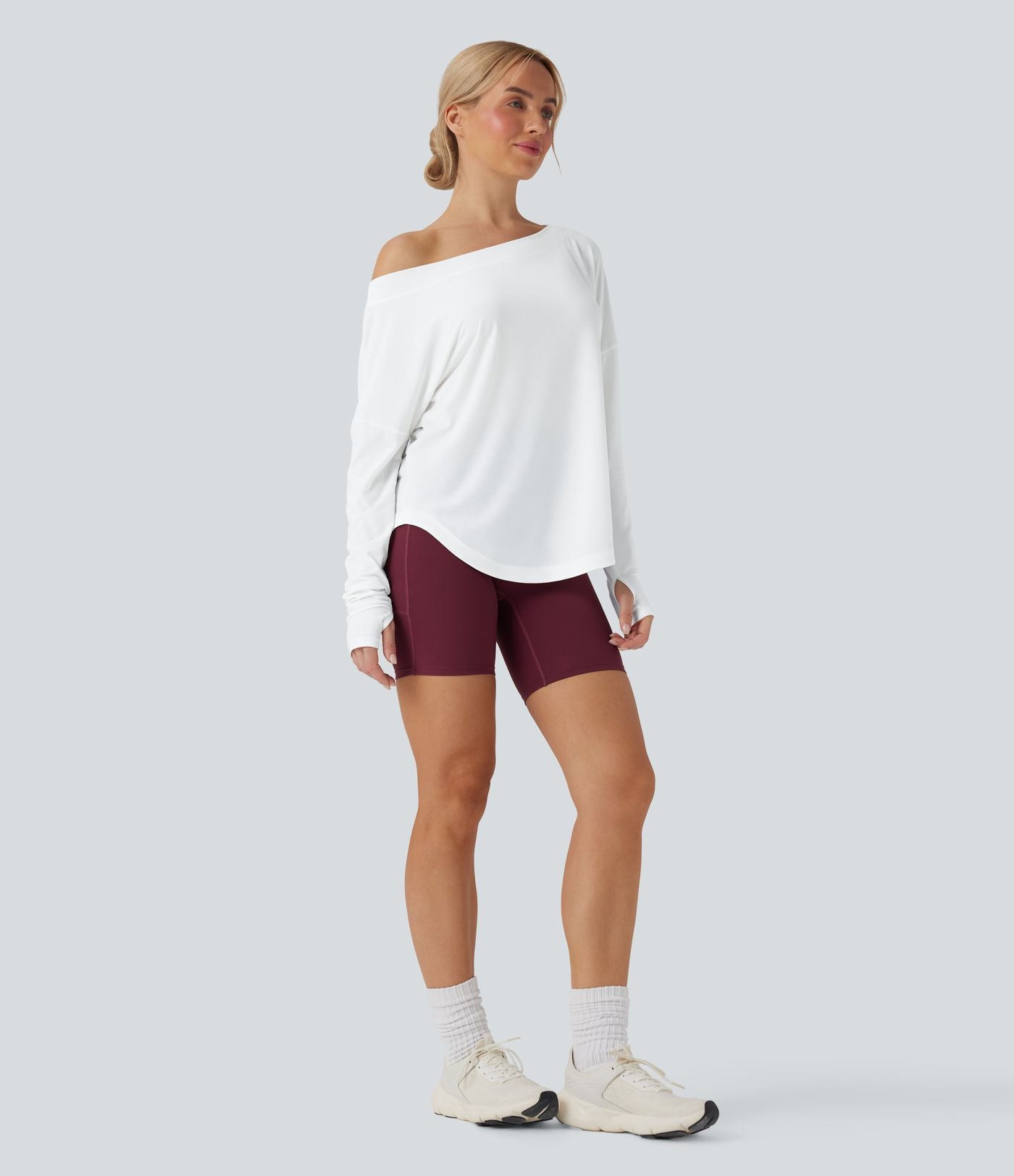 Top yoga sport séchage rapide une épaule manches longues trous pouces ourlet arrondi haut-bas