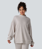 Sweat-shirt gaufré col montant manches longues coupe décontractée avec poches