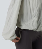 Veste de course légère à capuche manches longues avec poches, cordon de serrage et protection UPF 50+