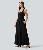 Robe longue fluide décontractée sans manches décolleté en cœur bretelles croisées avec lien dans le dos et poches