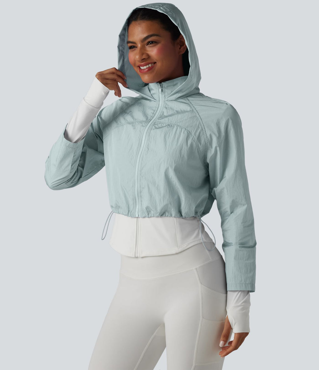 Veste de running 3-en-1 déperlante à capuche avec trous pour les pouces, ourlet arrondi et poches
