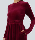 Robe longue en velours col montant manches longues avec poches