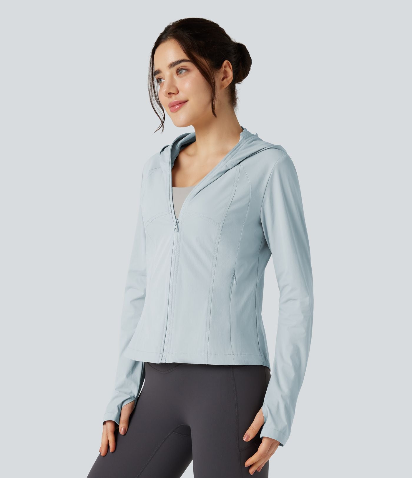 Veste de randonnée à capuche, manches longues, passants pouces et zip avec poches - UPF40+