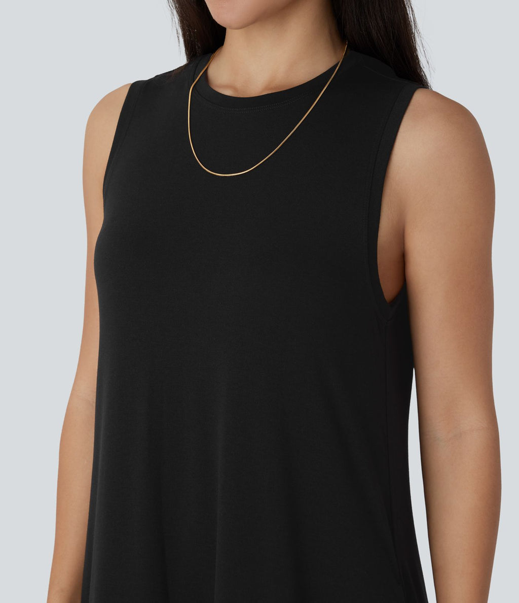Robe longue décontractée fluide à col rond, sans manches, poches latérales et ourlet asymétrique