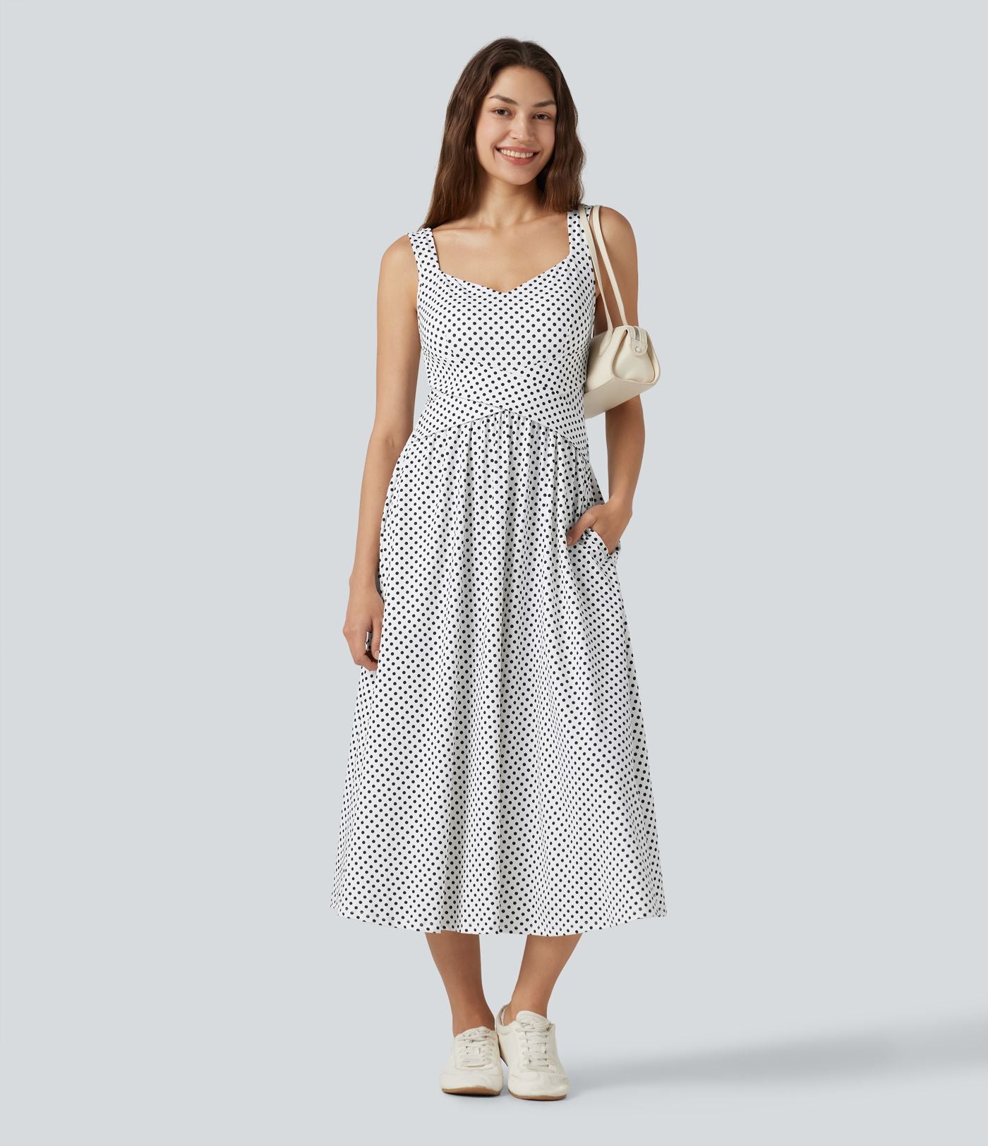 Robe fluide décontractée midi sans manches dos nu croisée à pois avec poches