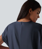 Robe de sport mini de yoga SoftlyZero™ Airy 2-en-1 effet frais InstantCool col rond à manches courtes, demi-zip et poches, accès facile Easy Peasy