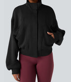 Veste de sport SpacerTek™ col montant, manches chauve-souris et détails contrastants, avec poches