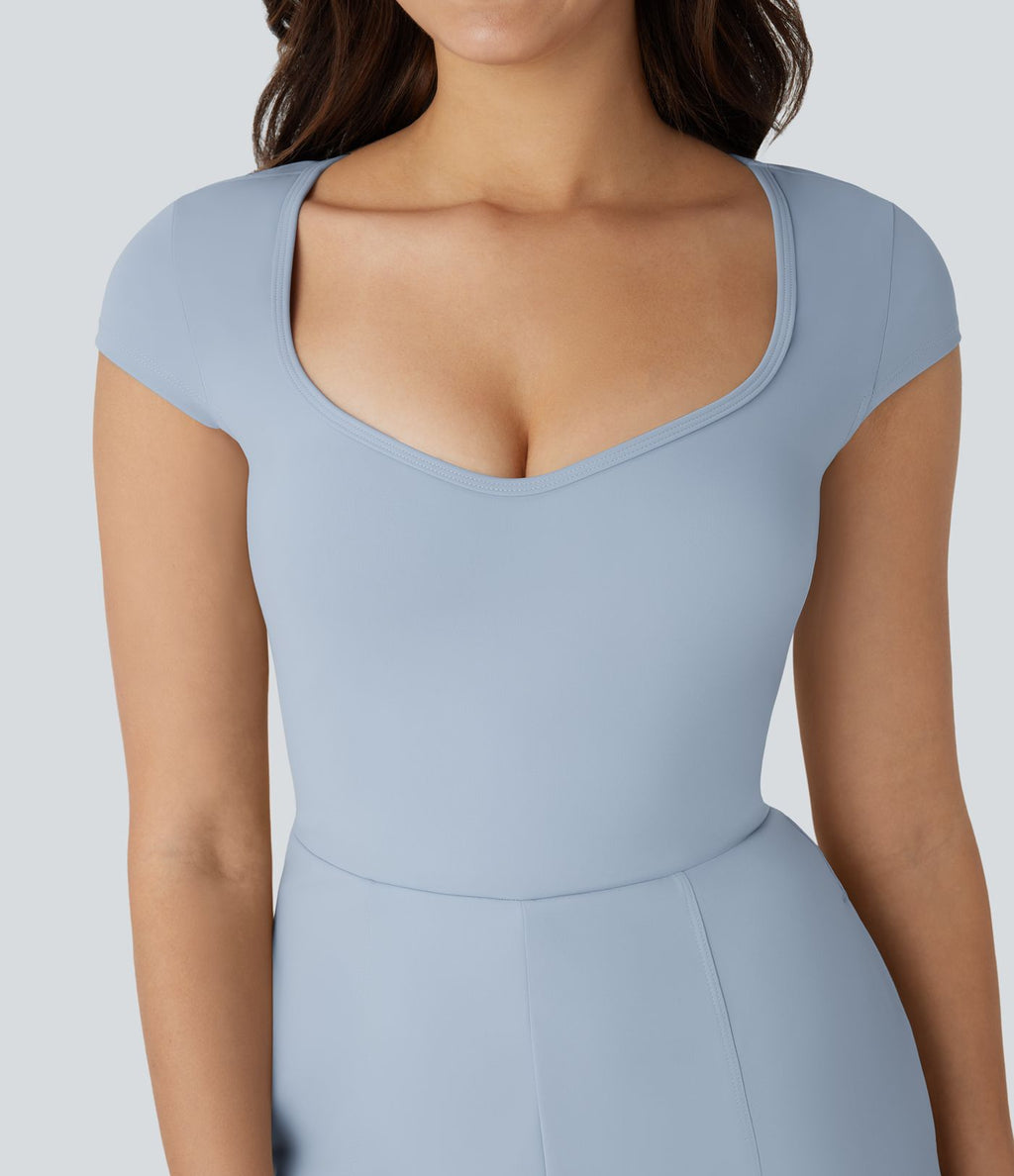 Combinaison de yoga Softlyzero™ Airy avec col U, manches courtes et poches latérales - Édition Easy Peasy
