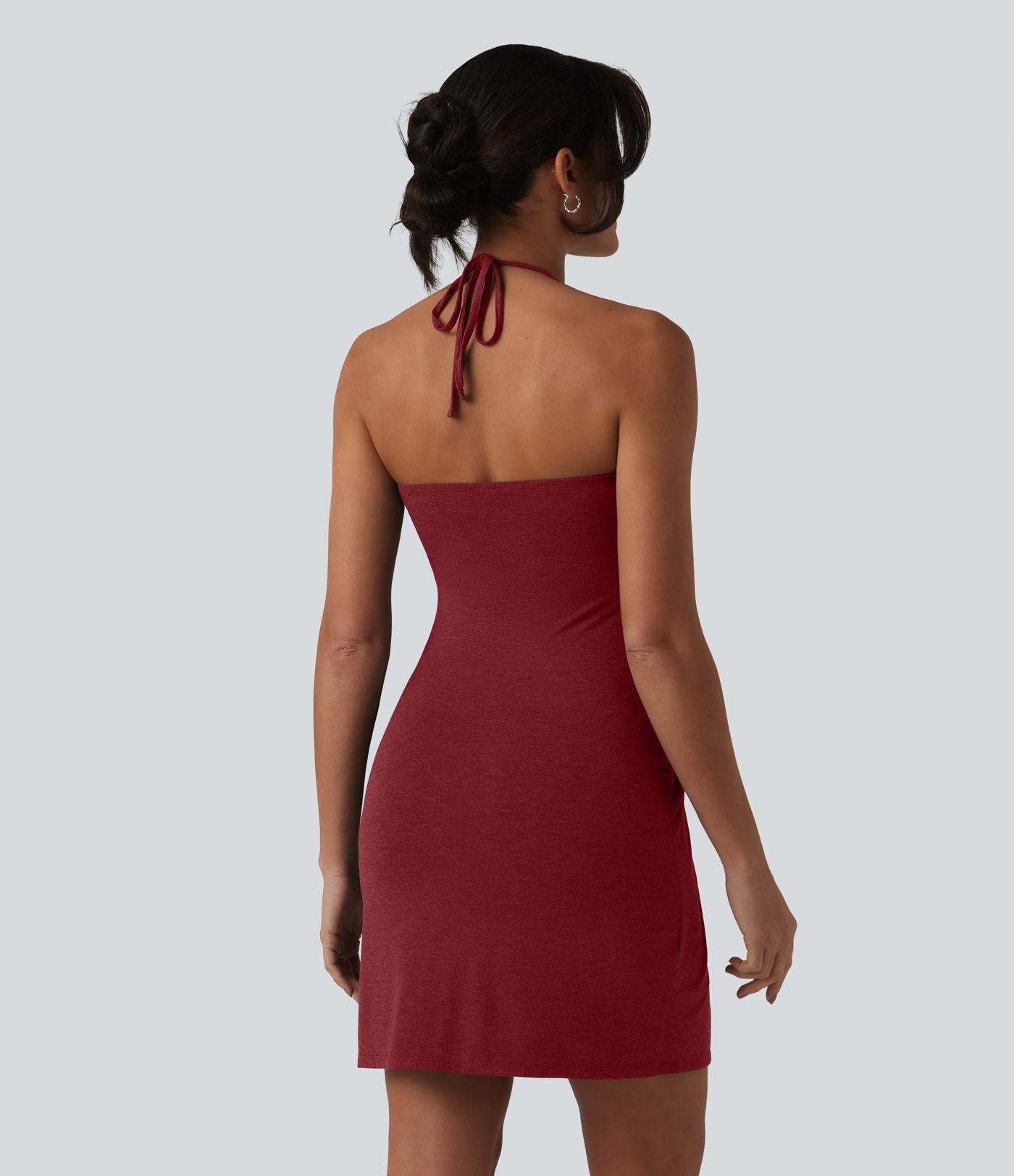 Robe resort mini dos nu à col licou avec lien noué dans le dos et poches