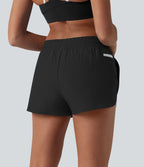 Breezeful™ Short de course taille mi-haute à séchage rapide, cordon de serrage, ourlet arrondi, sous-short intégré et poches