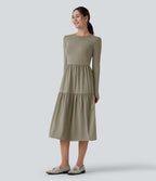 Robe tailleur mi-longue col rond manches longues ourlet à volants étagés
