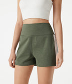 Short baggy de sport taille haute à séchage rapide avec bandes latérales et poches
