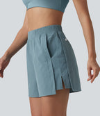 Short de tennis taille haute effet frais InstantCool avec fentes et poches, protection solaire UPF50+
