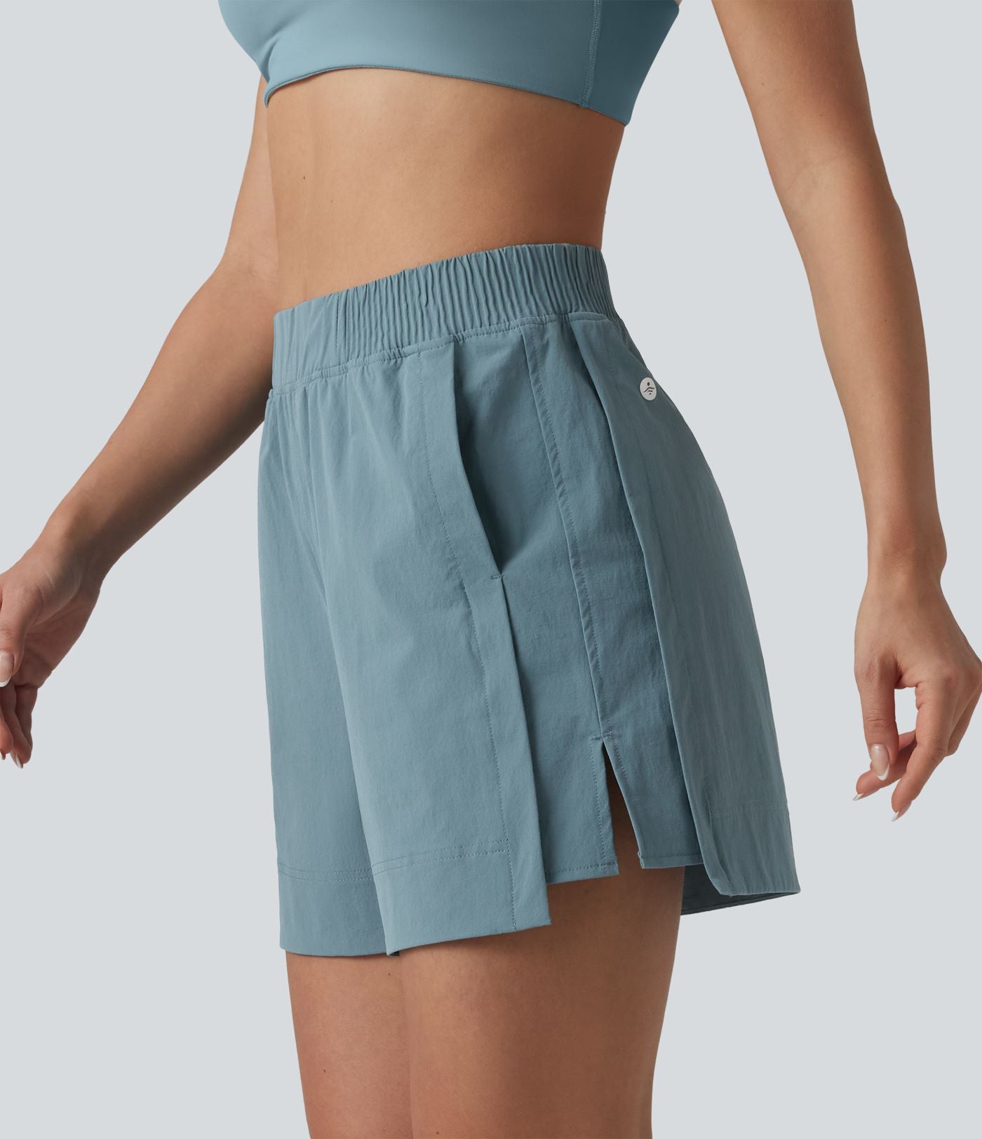 Short de tennis taille haute effet frais InstantCool avec fentes et poches, protection solaire UPF50+