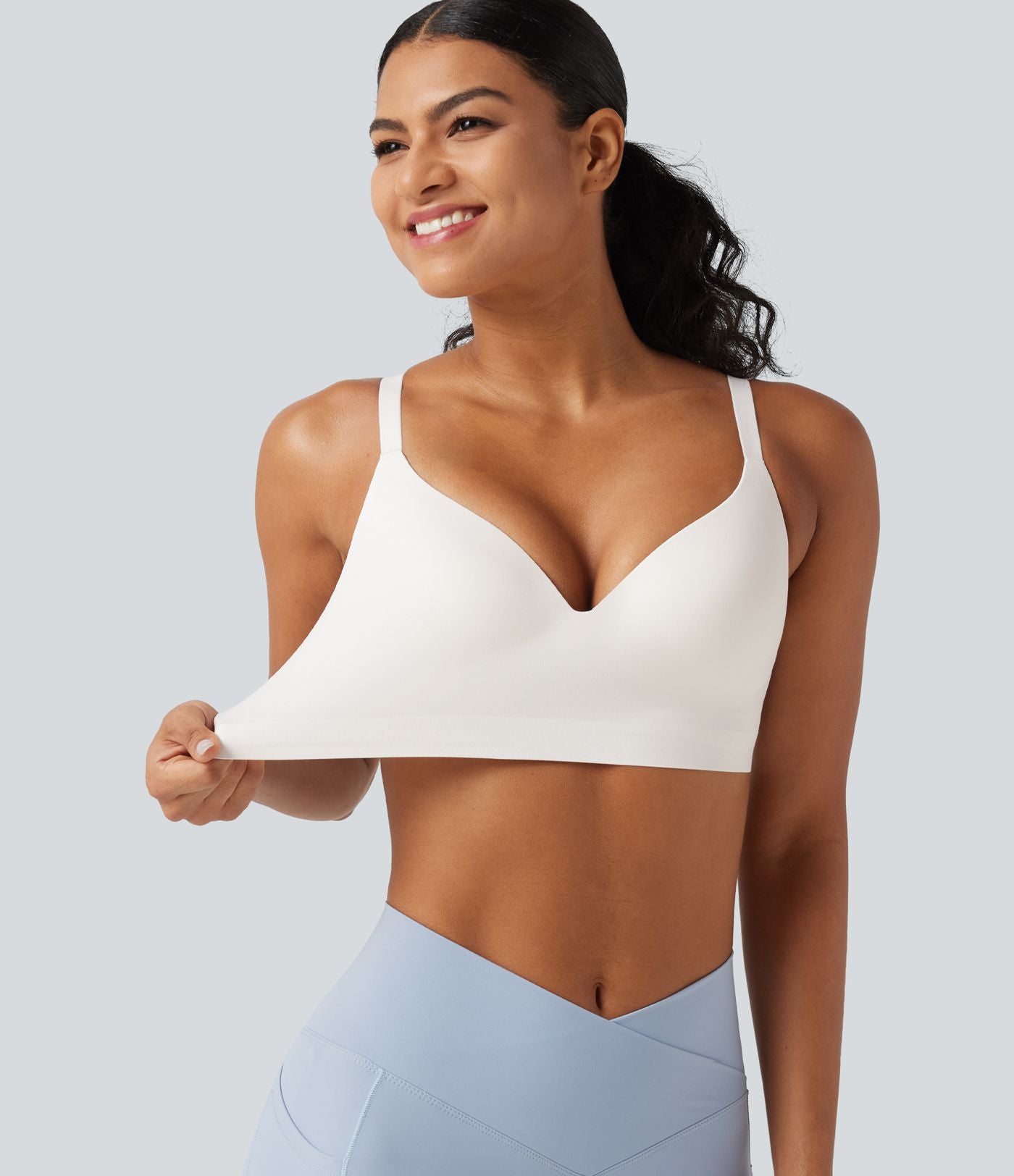Brassière yoga SoftlyZero™ maintien léger à décolleté V plongeant, coussinets fixes, push-up, protection solaire UPF 50+