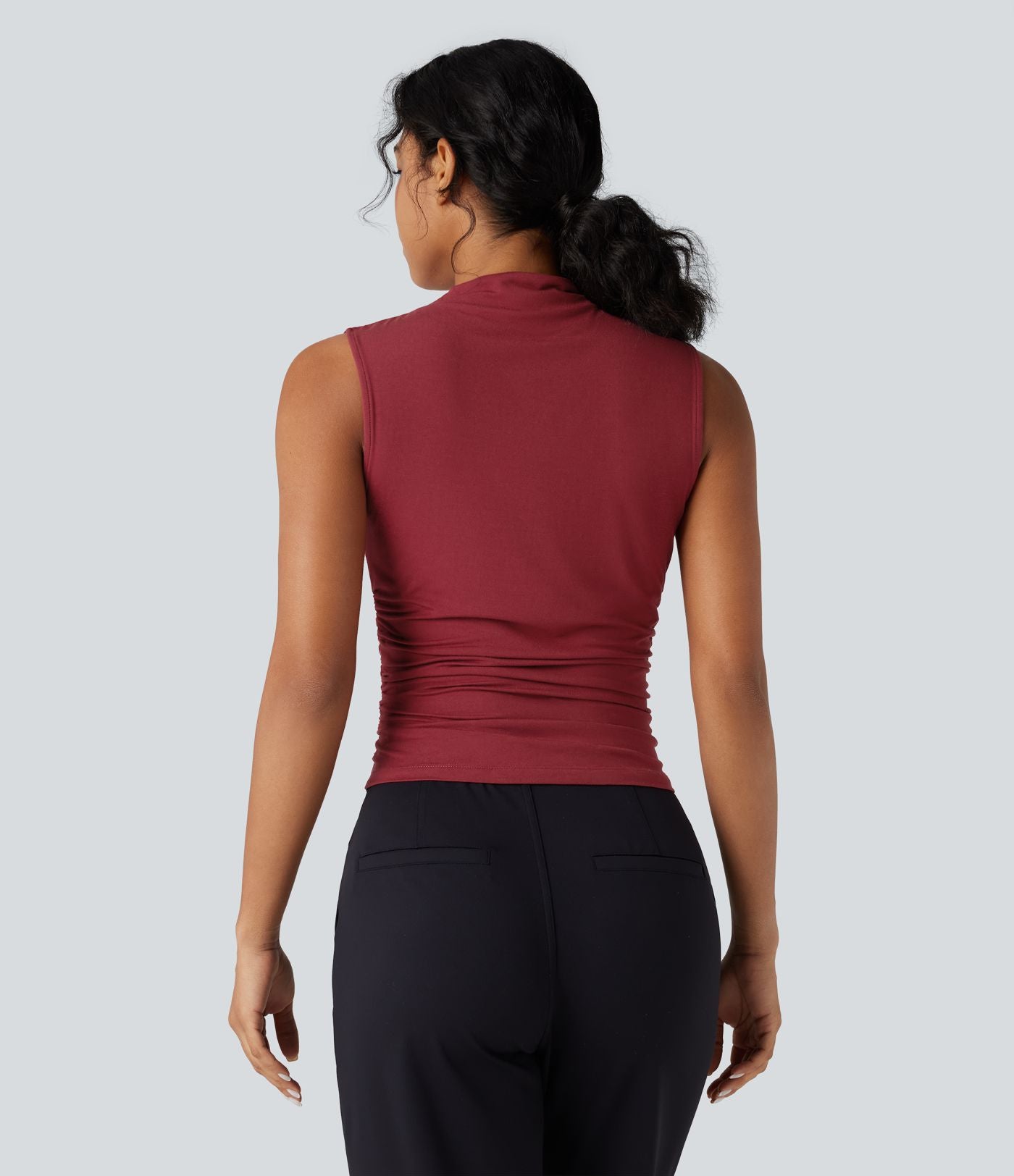 Top tailleur froncé col montant sans manches