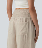 Pantalon casual bouffant aspect lin avec fronces taille haute et poches