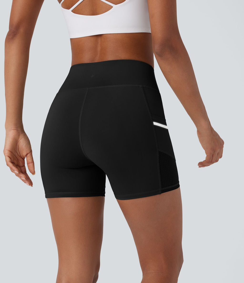 Short de sport SoftlyZero™ Airy taille haute 10 cm avec bandes réfléchissantes contrastées, empiècements ajourés et poches latérales à effet frais InstantCool