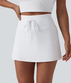 Jupe de tennis SoftlyZero™ Airy mini 2-en-1 gainante taille haute à cordon de serrage et effet frais InstantCool avec poches