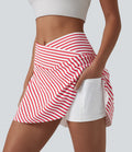 Jupe de tennis mini 2 en 1 à rayures, taille haute croisée, ourlet arrondi et poches