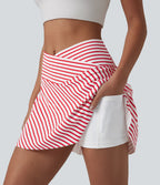 Jupe de tennis mini 2 en 1 à rayures, taille haute croisée, ourlet arrondi et poches