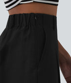 Bermuda ample infroissable taille haute plissé aspect lin avec fermeture éclair invisible et poches