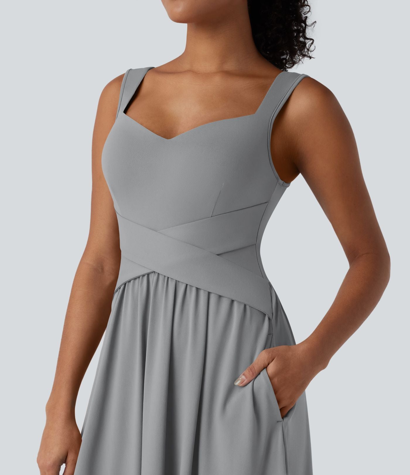 Robe midi fluide sans manches dos croisé ouvert avec poches