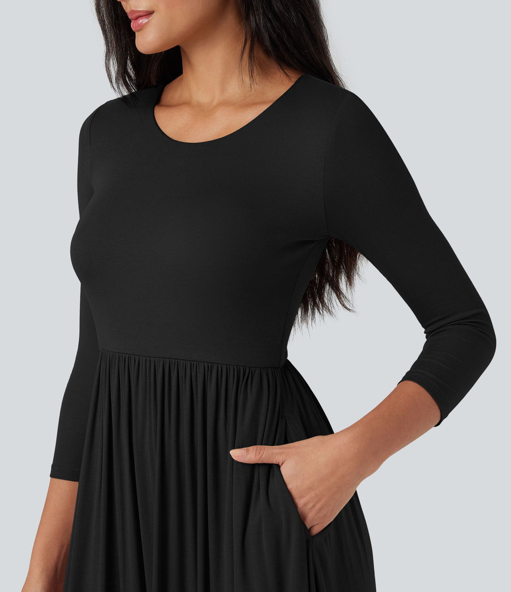 Robe longue fluide décontractée maille côtelée col rond manches 3/4 avec poches