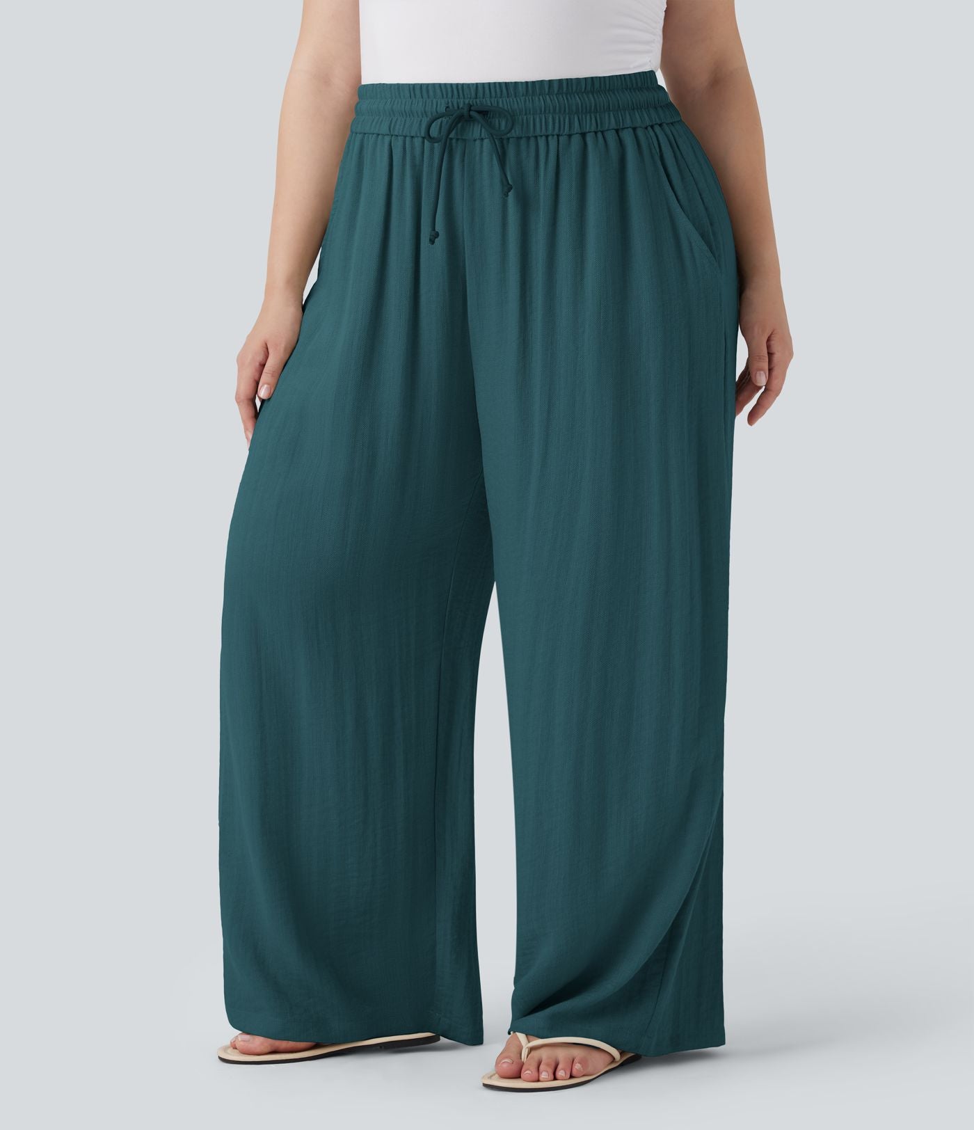 Pantalon décontracté grande taille large fluide taille haute effet lin avec cordon de serrage et poches