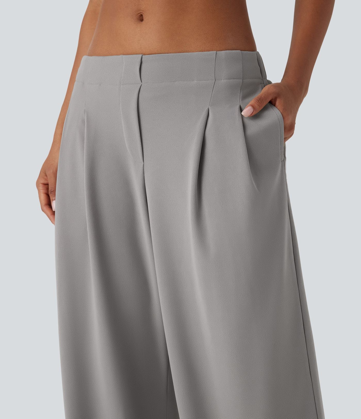 Pantalon décontracté taille basse à jambes larges en tissu gaufré avec poches latérales