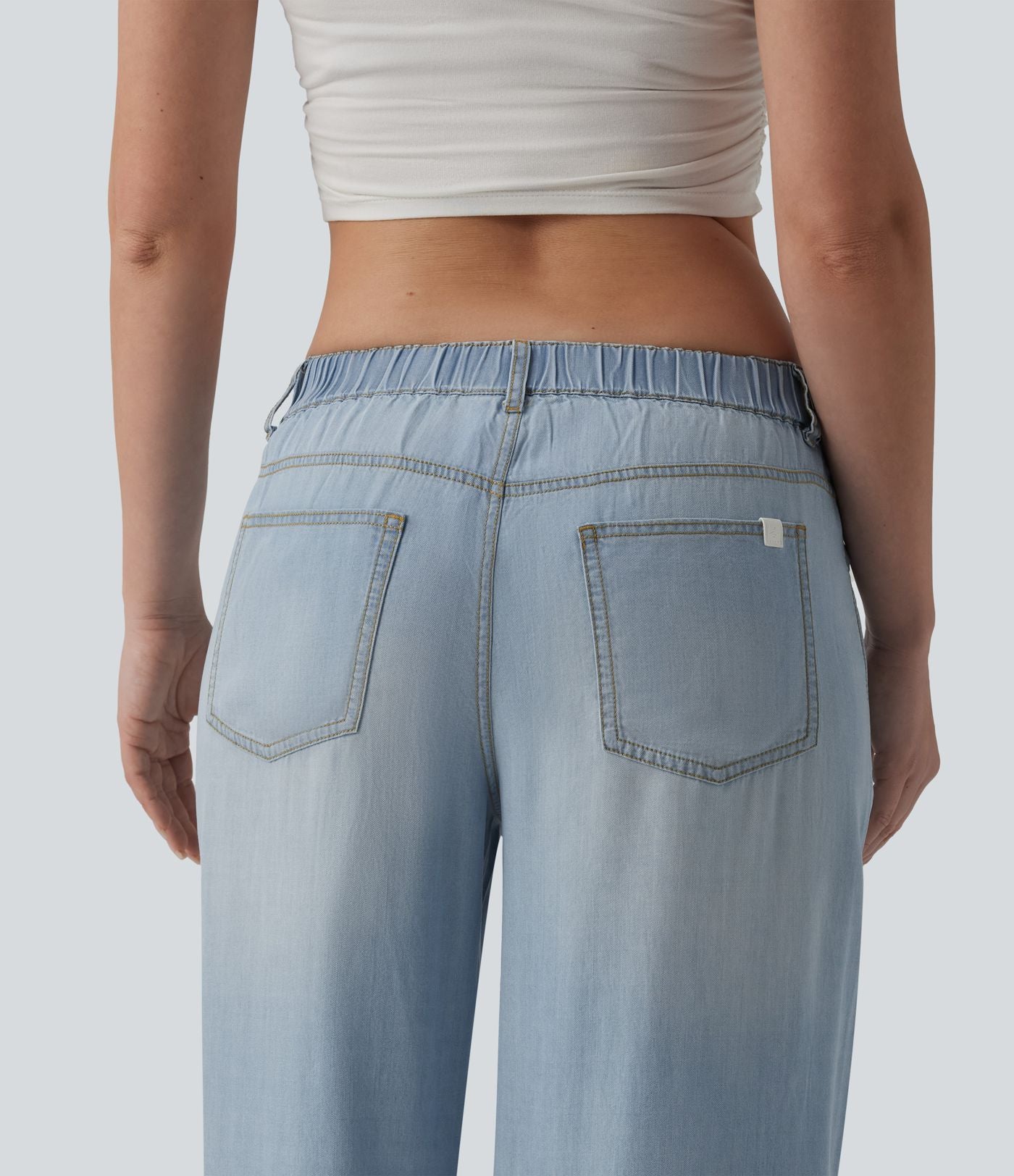 Jean large décontracté taille basse en lyocell drapé avec poches