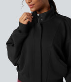 Veste de sport SpacerTek™ col montant, manches chauve-souris et détails contrastants, avec poches