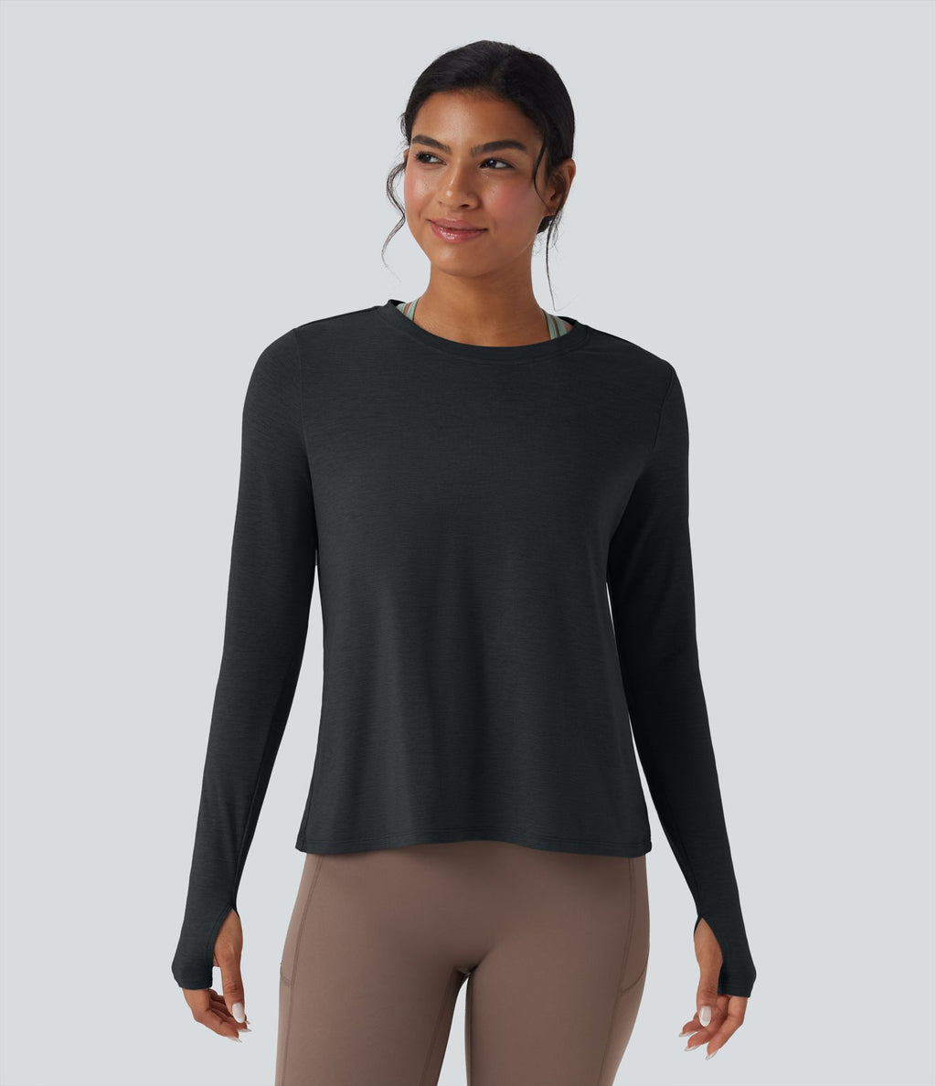 Haut de sport yoga dos nu manches longues avec trous pouces