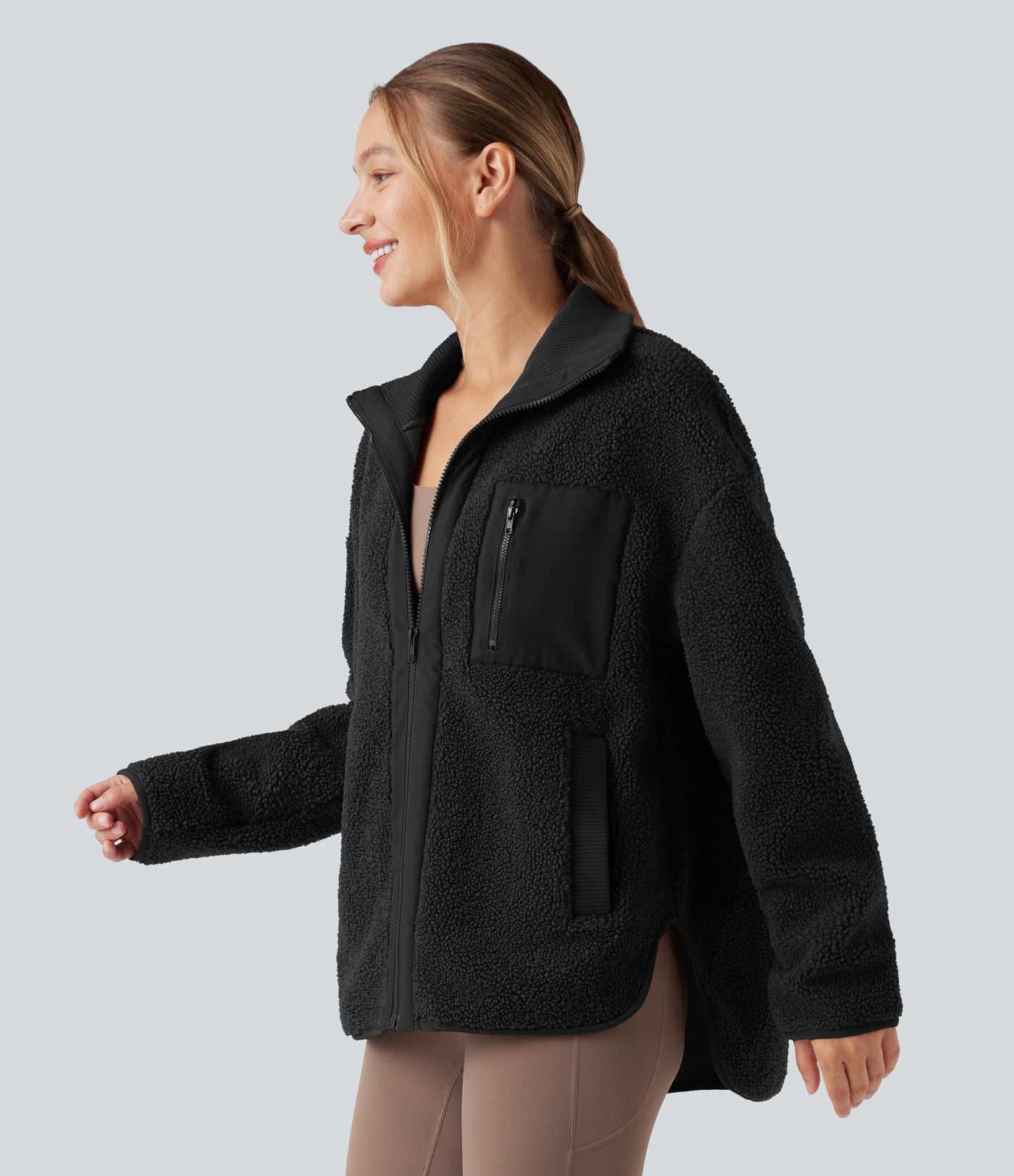 Veste de sport sherpa à manches longues avec ourlet asymétrique arrondi et poches