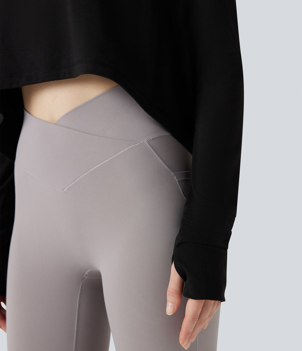 Top de sport running asymétrique col rond coupe décontractée manches longues avec trous pouces
