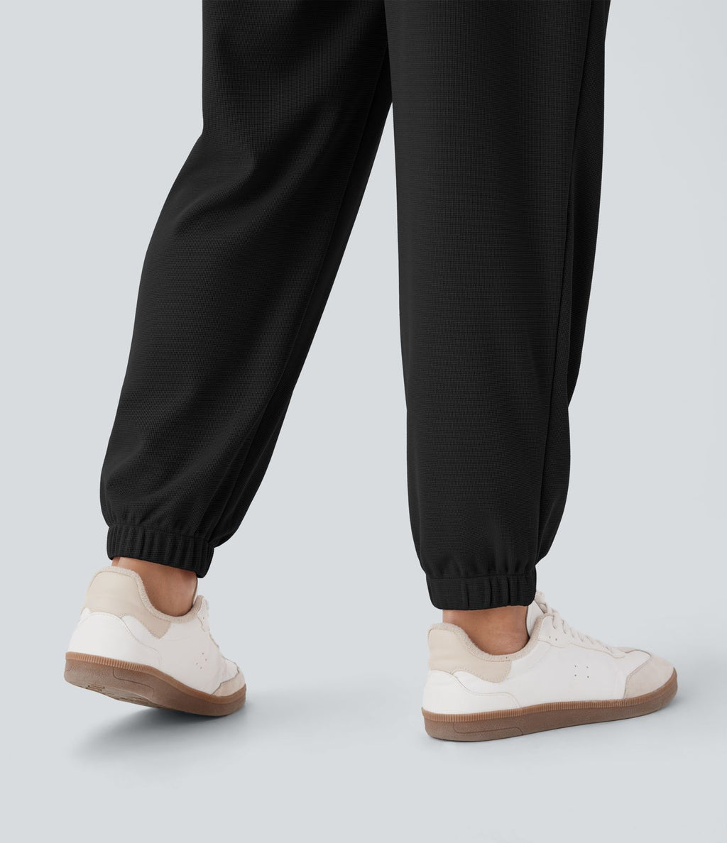 Pantalon de jogging décontracté taille haute fuselé en tissu gaufré avec poche latérale