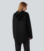 Sweat-shirt à capuche avec cordon de serrage à manches longues et ourlet arrondi avec poche