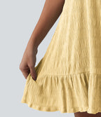 Robe courte décontractée sans manches à col rond, soutien-gorge intégré et ourlet à volants