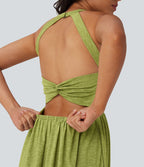Robe longue fluide fendue avec poches latérales, dos nu et effet torsadé