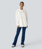Sweat-shirt décontracté à capuche avec cordon de serrage, manches longues, poche kangourou, coupe croisée et fente
