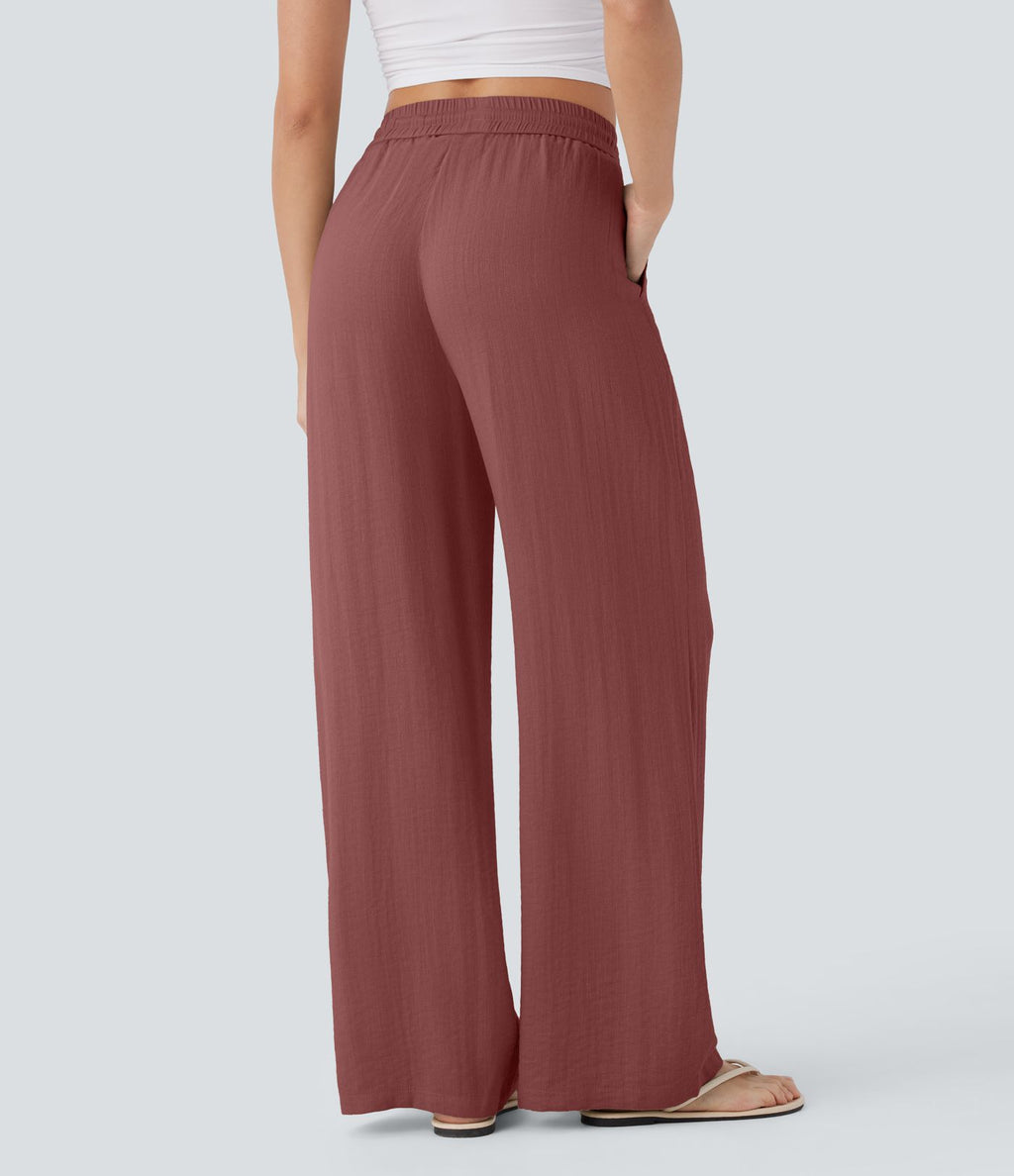 Pantalon large fluide taille haute avec cordon de serrage, poches latérales et aspect lin